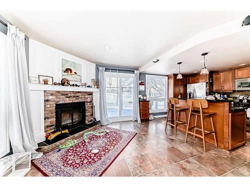 28 Hawkfield Place Nw, Calgary, AB - Indoor With Fireplace