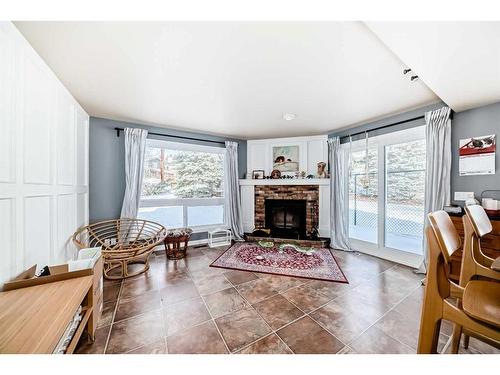 28 Hawkfield Place Nw, Calgary, AB - Indoor Photo Showing Living Room With Fireplace