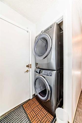 28 Hawkfield Place Nw, Calgary, AB - Indoor Photo Showing Laundry Room