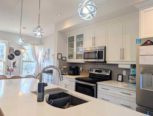 18 Sage Meadows Terrace Nw, Calgary, AB - Indoor Photo Showing Kitchen With Double Sink With Upgraded Kitchen