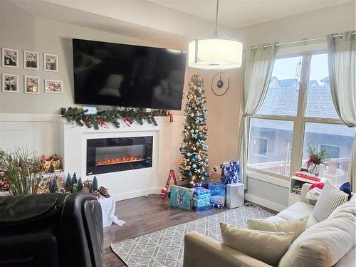 18 Sage Meadows Terrace Nw, Calgary, AB - Indoor Photo Showing Living Room With Fireplace