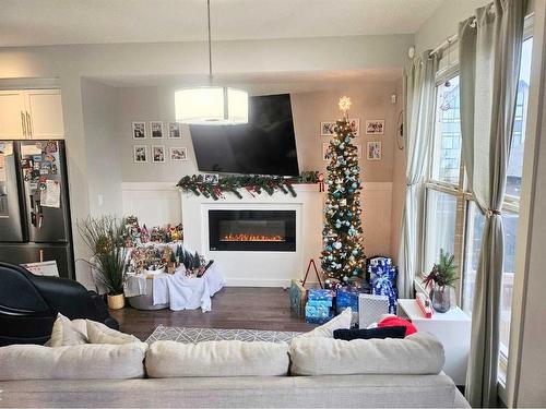 18 Sage Meadows Terrace Nw, Calgary, AB - Indoor Photo Showing Living Room With Fireplace