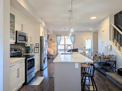 18 Sage Meadows Terrace Nw, Calgary, AB - Indoor Photo Showing Kitchen With Upgraded Kitchen