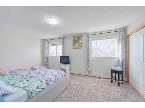 13 Mt Aberdeen Manor Se, Calgary, AB - Indoor Photo Showing Bedroom