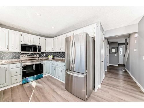 83 Ranchridge Way Nw, Calgary, AB - Indoor Photo Showing Kitchen