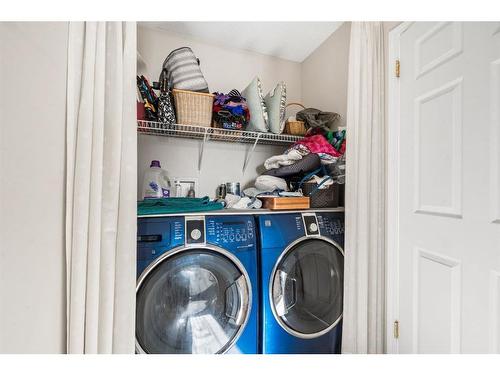 212 Tuscany Valley Way Nw, Calgary, AB - Indoor Photo Showing Laundry Room