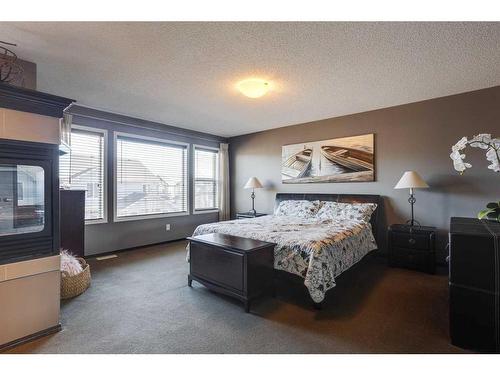 692 New Brighton Drive Se, Calgary, AB - Indoor Photo Showing Bedroom