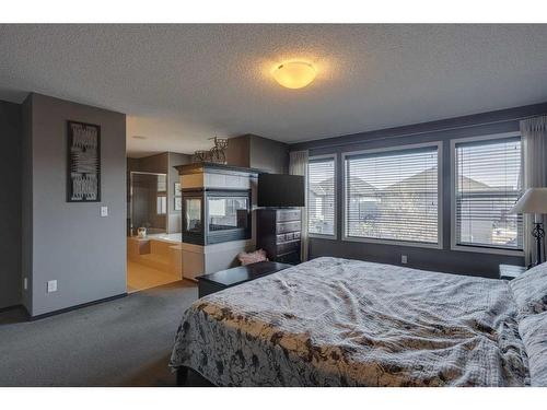 692 New Brighton Drive Se, Calgary, AB - Indoor Photo Showing Bedroom