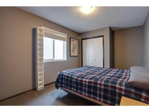 692 New Brighton Drive Se, Calgary, AB - Indoor Photo Showing Bedroom