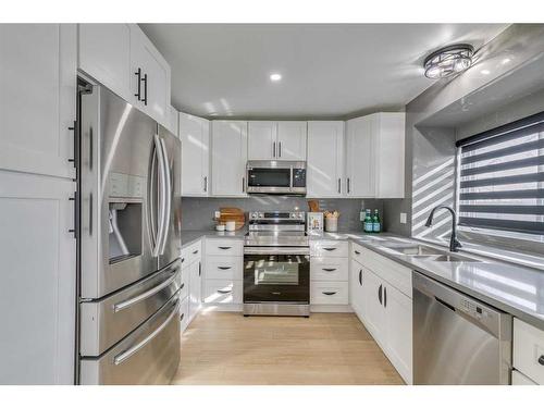 72 Mckenna Way Se, Calgary, AB - Indoor Photo Showing Kitchen With Upgraded Kitchen