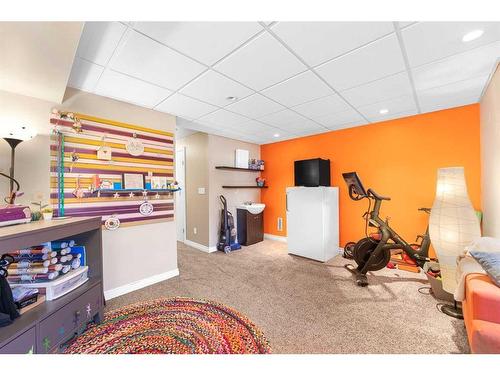 39 Ranch Glen Drive Nw, Calgary, AB - Indoor Photo Showing Gym Room