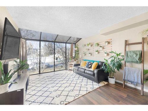 39 Ranch Glen Drive Nw, Calgary, AB - Indoor Photo Showing Living Room