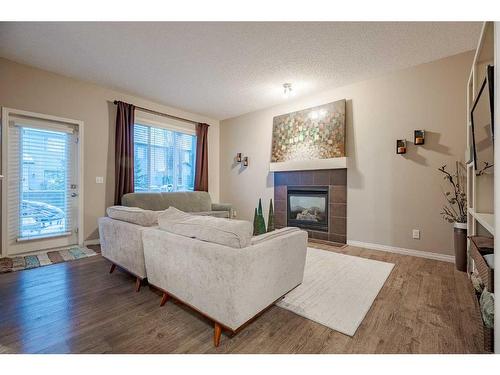 98 Everwoods Link Sw, Calgary, AB - Indoor Photo Showing Living Room With Fireplace