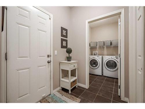 98 Everwoods Link Sw, Calgary, AB - Indoor Photo Showing Laundry Room