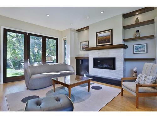 414 Wildwood Drive Sw, Calgary, AB - Indoor Photo Showing Living Room With Fireplace