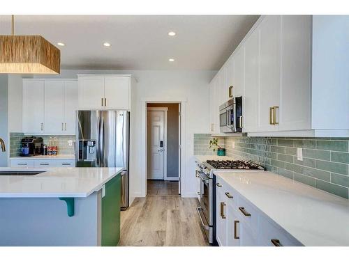 56 Elgin Meadows Link Se, Calgary, AB - Indoor Photo Showing Kitchen With Upgraded Kitchen