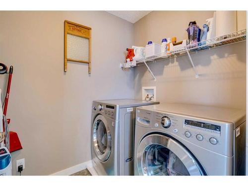 56 Elgin Meadows Link Se, Calgary, AB - Indoor Photo Showing Laundry Room