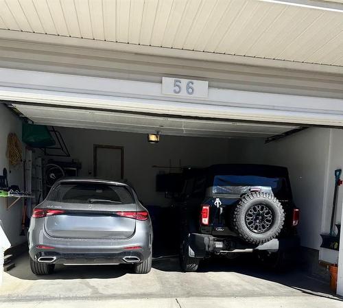 56 Elgin Meadows Link Se, Calgary, AB - Indoor Photo Showing Garage