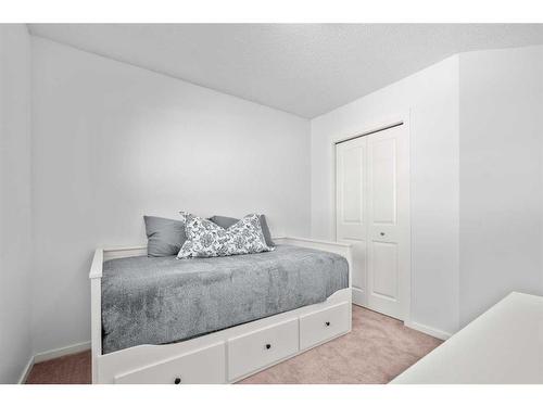 310 Nolan Hill Drive Nw, Calgary, AB - Indoor Photo Showing Bedroom