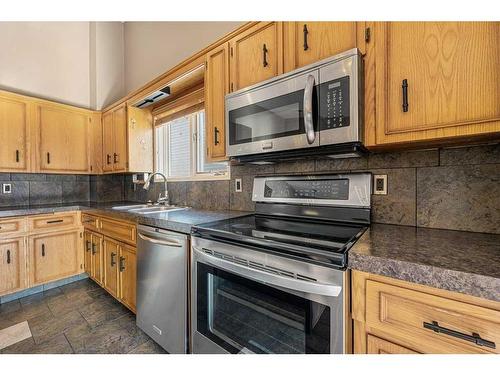 52 Hawkcliff Way Nw, Calgary, AB - Indoor Photo Showing Kitchen With Double Sink