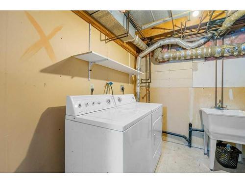 52 Hawkcliff Way Nw, Calgary, AB - Indoor Photo Showing Laundry Room