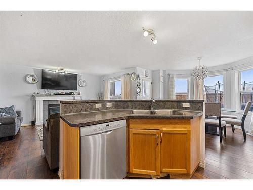 253 Saddlecrest Way Ne, Calgary, AB - Indoor Photo Showing Kitchen With Double Sink