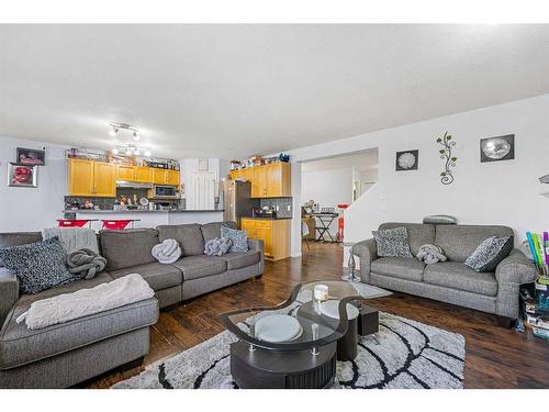 253 Saddlecrest Way Ne, Calgary, AB - Indoor Photo Showing Living Room