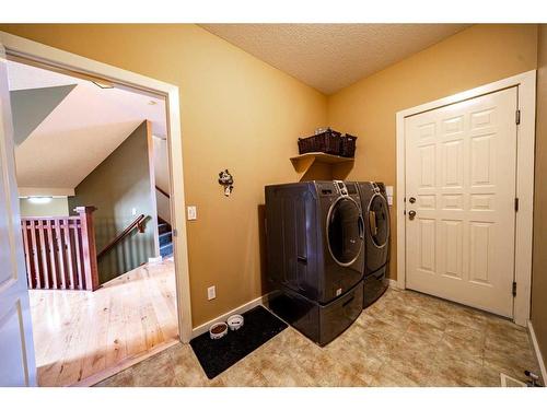 48 Chapala Square Se, Calgary, AB - Indoor Photo Showing Laundry Room