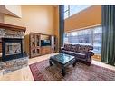 48 Chapala Square Se, Calgary, AB  - Indoor Photo Showing Living Room With Fireplace 