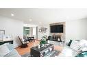 127 Ranchview Mews Nw, Calgary, AB  - Indoor Photo Showing Living Room With Fireplace 