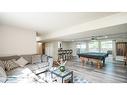 127 Ranchview Mews Nw, Calgary, AB  - Indoor Photo Showing Living Room 