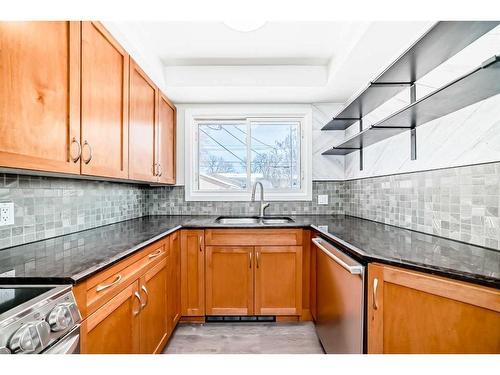 1960 Cottonwood Crescent Se, Calgary, AB - Indoor Photo Showing Kitchen With Double Sink