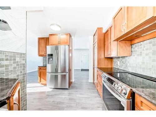 1960 Cottonwood Crescent Se, Calgary, AB - Indoor Photo Showing Kitchen With Stainless Steel Kitchen