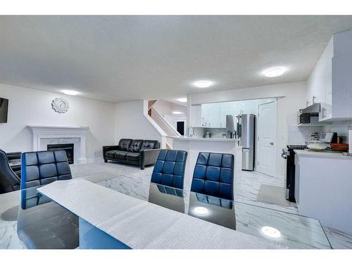 143 Taralake Way Ne, Calgary, AB - Indoor With Fireplace