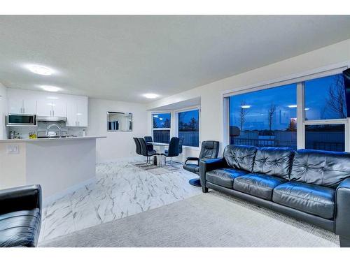 143 Taralake Way Ne, Calgary, AB - Indoor Photo Showing Living Room