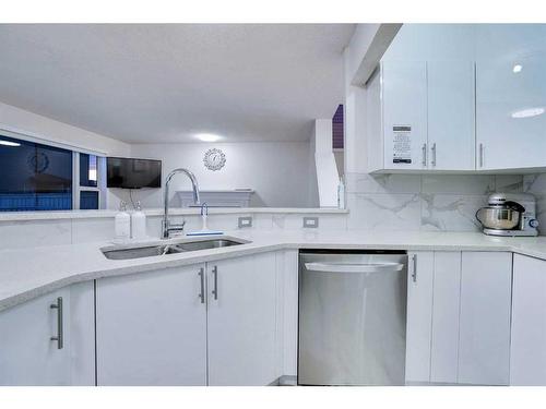 143 Taralake Way Ne, Calgary, AB - Indoor Photo Showing Kitchen With Double Sink