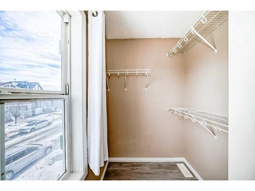 69 New Brighton Green Se, Calgary, AB - Indoor With Storage