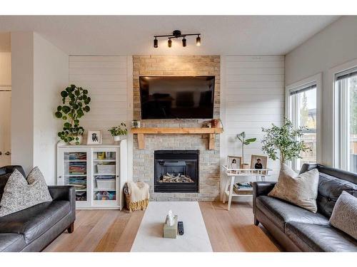 109 Evanspark Gardens Nw, Calgary, AB - Indoor Photo Showing Living Room With Fireplace