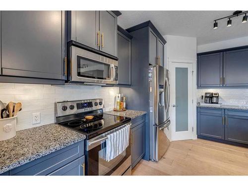 109 Evanspark Gardens Nw, Calgary, AB - Indoor Photo Showing Kitchen With Upgraded Kitchen