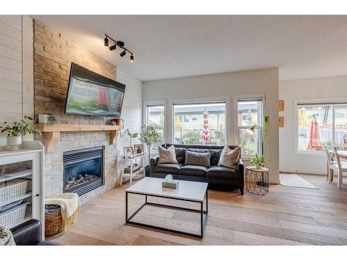 109 Evanspark Gardens Nw, Calgary, AB - Indoor Photo Showing Living Room With Fireplace