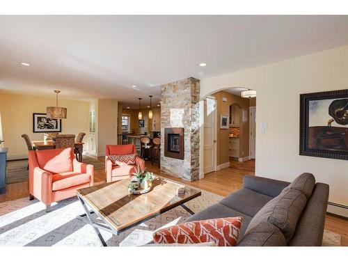 73 Holden Road Sw, Calgary, AB - Indoor Photo Showing Living Room With Fireplace