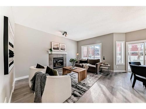 29 Silverado Skies Drive Sw, Calgary, AB - Indoor Photo Showing Living Room With Fireplace