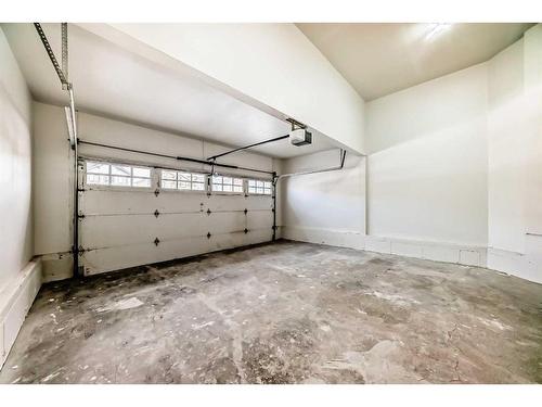 29 Silverado Skies Drive Sw, Calgary, AB - Indoor Photo Showing Garage