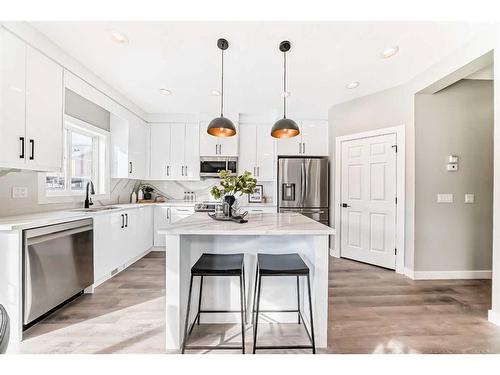 29 Silverado Skies Drive Sw, Calgary, AB - Indoor Photo Showing Kitchen With Stainless Steel Kitchen With Upgraded Kitchen