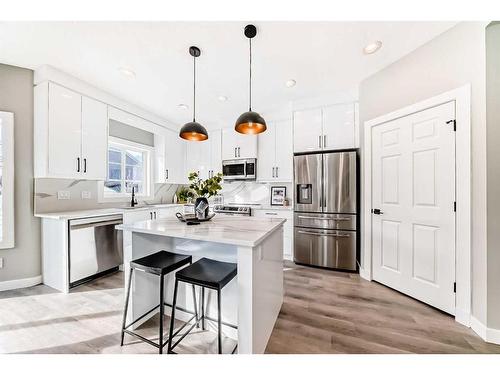 29 Silverado Skies Drive Sw, Calgary, AB - Indoor Photo Showing Kitchen With Stainless Steel Kitchen With Upgraded Kitchen