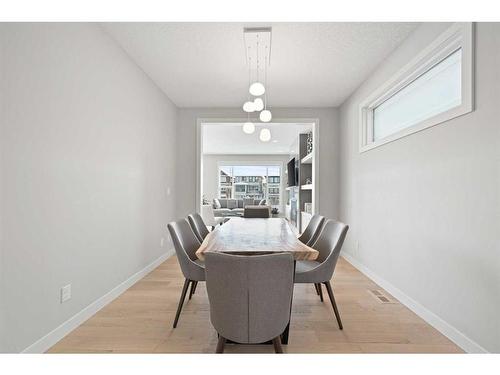 22 West Grove Way Sw, Calgary, AB - Indoor Photo Showing Dining Room