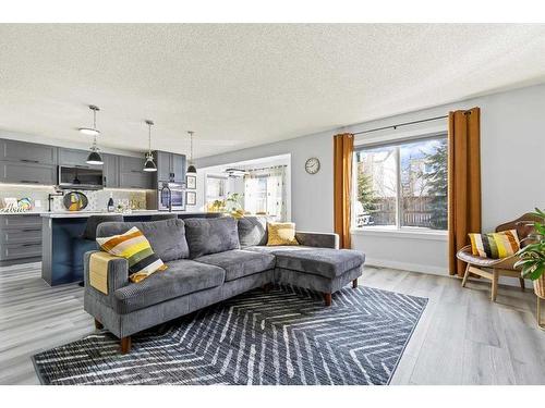 130 Chapalina Close Se, Calgary, AB - Indoor Photo Showing Living Room