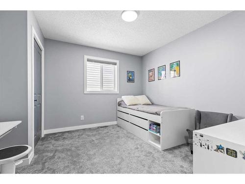 130 Chapalina Close Se, Calgary, AB - Indoor Photo Showing Bedroom