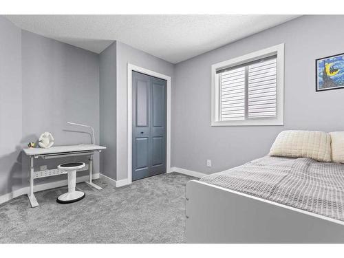 130 Chapalina Close Se, Calgary, AB - Indoor Photo Showing Bedroom