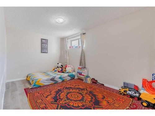 214 Cranford Park Se, Calgary, AB - Indoor Photo Showing Bedroom